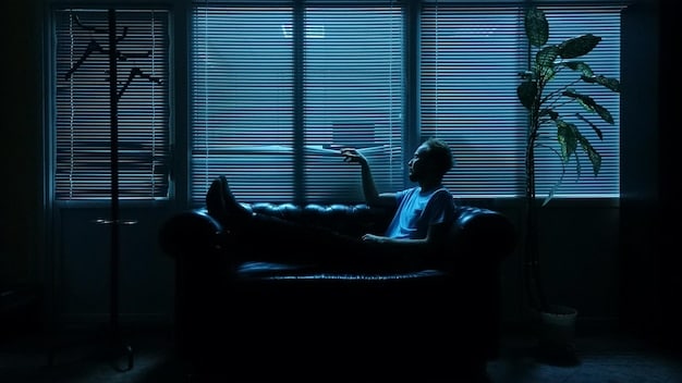 A person sitting on a couch late at night, illuminated only by the screen of a laptop, intently watching a Korean drama and reading the English subtitles. Soft lighting and a cozy setting emphasize the immersive experience.