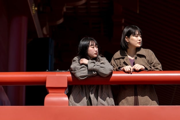 A still from a Korean drama showing a character bowing slightly while saying 