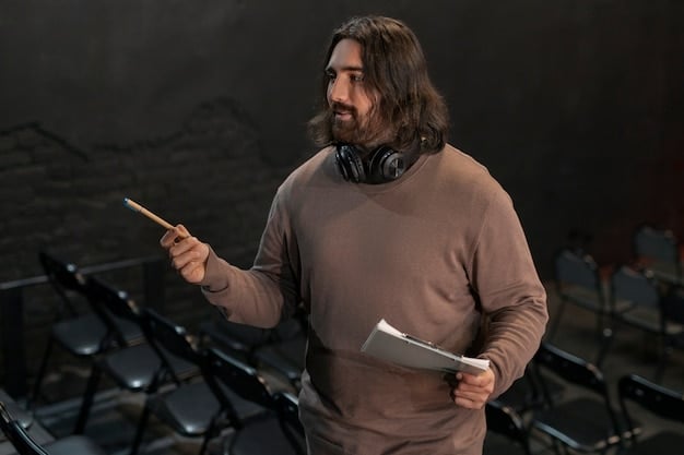 A close-up shot of a critic in a theater, attentively taking notes during a live performance, highlighting the process of reviewing a drama.