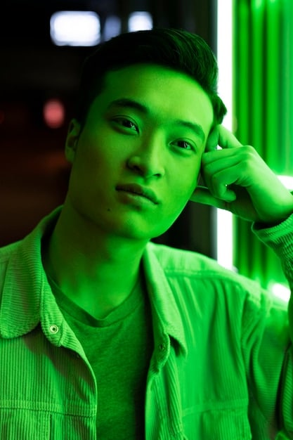 A close-up shot of a K-Drama actor's expressive face during an emotional scene, highlighting their acting skills and emotive range. The lighting is dramatic, enhancing the mood.