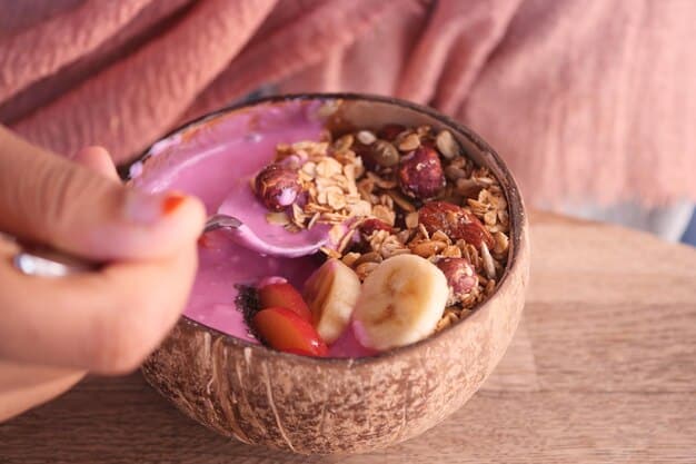 A brightly lit photograph of a K-Drama actor in California, holding a colorful acai bowl topped with fresh fruits, granola, and a drizzle of honey, with the Pacific Ocean visible in the background.