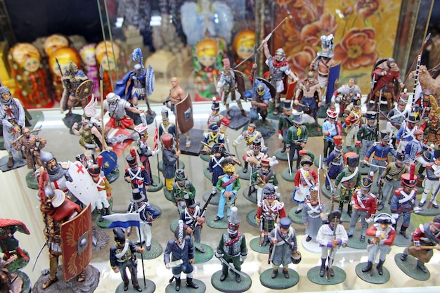 A bustling scene at a fan convention, with attendees dressed in costumes from various drama series available on streaming platforms. The focus is on the colorful and enthusiastic crowd, with banners and displays showcasing different shows.