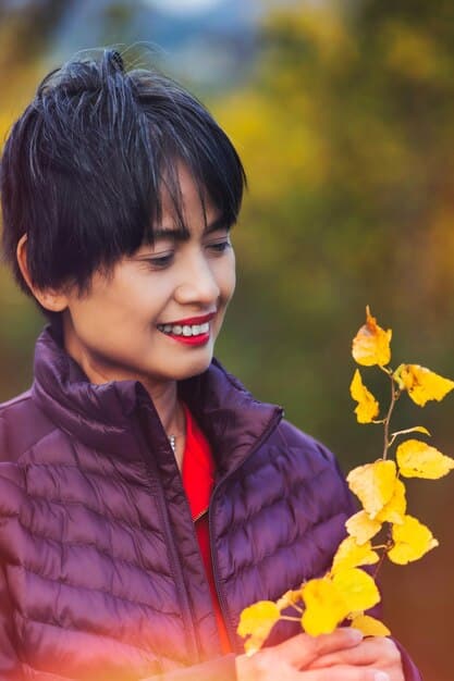 A bright, hopeful portrait of a young male K-drama actor with a warm smile and approachable demeanor, set against a blurred, soft-focus natural background, emphasizing youth and potential, in a contemporary, high-key lighting style.